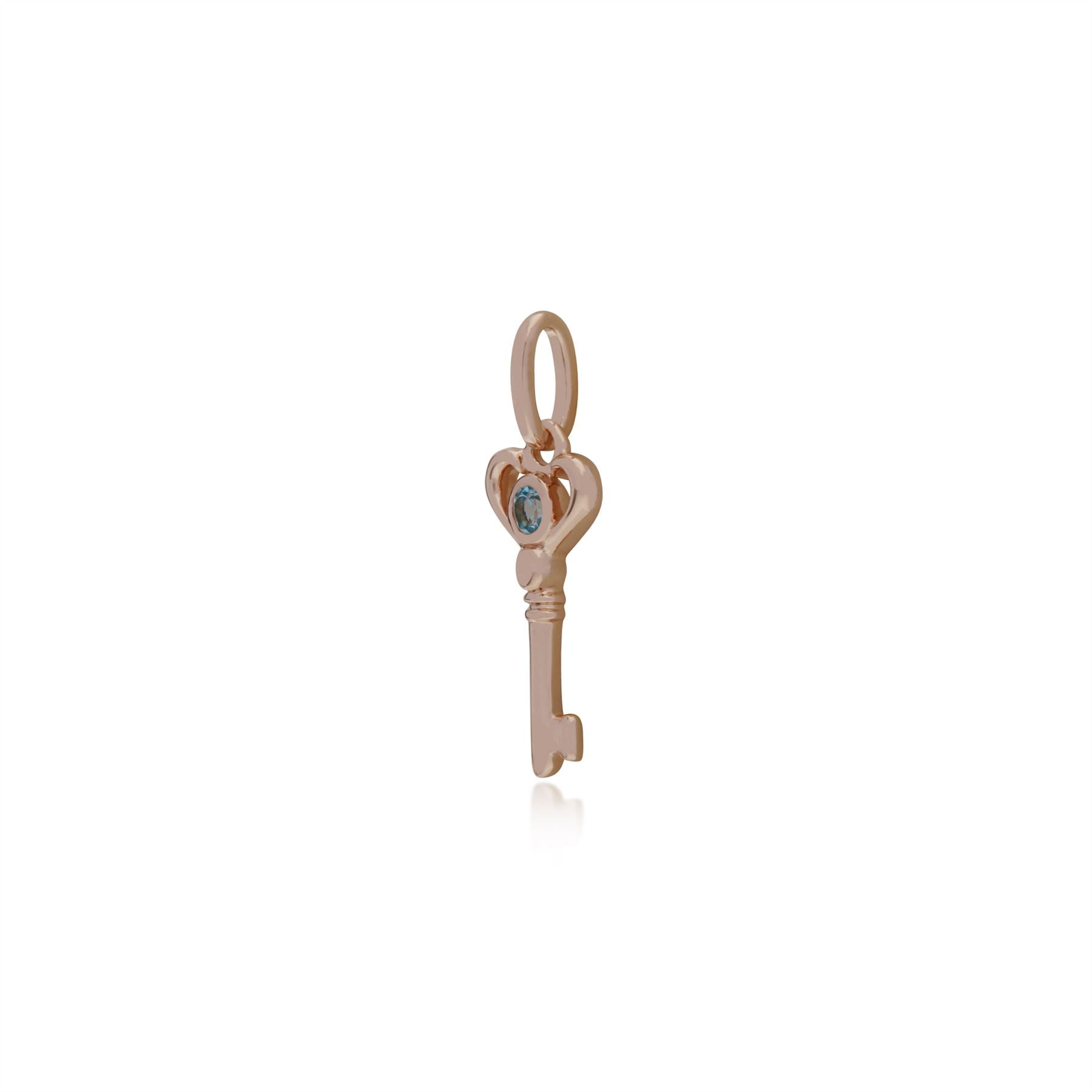 Classico ciondolo a forma di chiave piccola placcato oro rosa in argento 925 con topazio azzurro rotondo