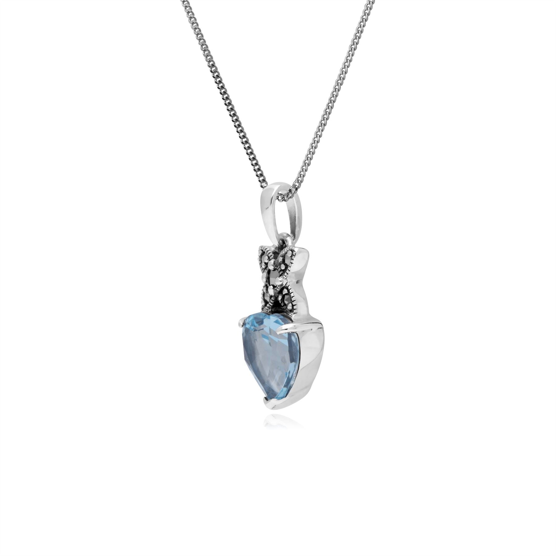 Ciondolo cuore classico in argento 925 con topazio azzurro e marcasite cauzione incrociata