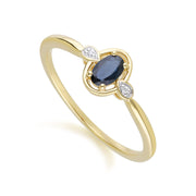 Anello classico in oro giallo 9 carati con zaffiro ovale e diamanti rotondi