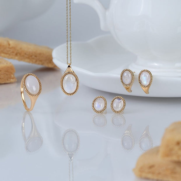 Boucles d'oreilles Clou Classique ovales avec pierre de lune arc-en-ciel en or jaune 9 carats