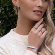 Bracciale rigido Siberian Waltz in smalto blu e topazio azzurro cielo ottagonale in vermeil oro rosa