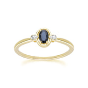Anello classico in oro giallo 9 carati con zaffiro ovale e diamanti rotondi