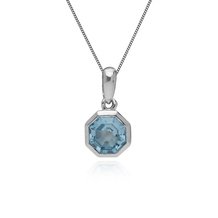 Anello e pendente geometrici in argento 925 con topazio blu ottagonale