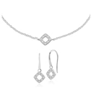 Orecchini a bottone e bracciale classico in oro bianco 375 con diamanti quadrati traforati