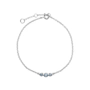 Bracciale in argento sterling con tre pietre di topazio azzurro rotondo sfumato da 19 cm